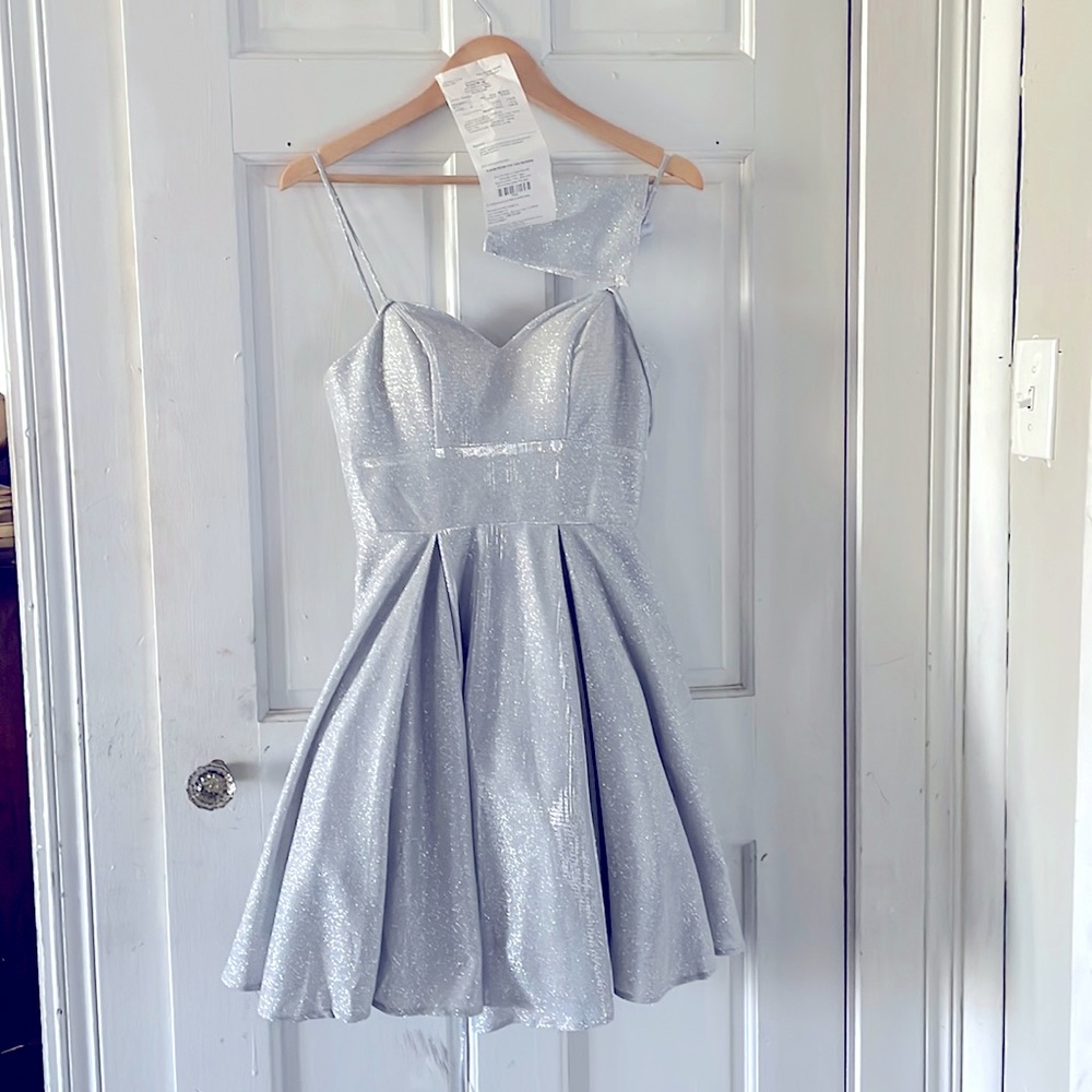 A silver and sparkly Bliss dress. Size S, with tags, in perfect condition.